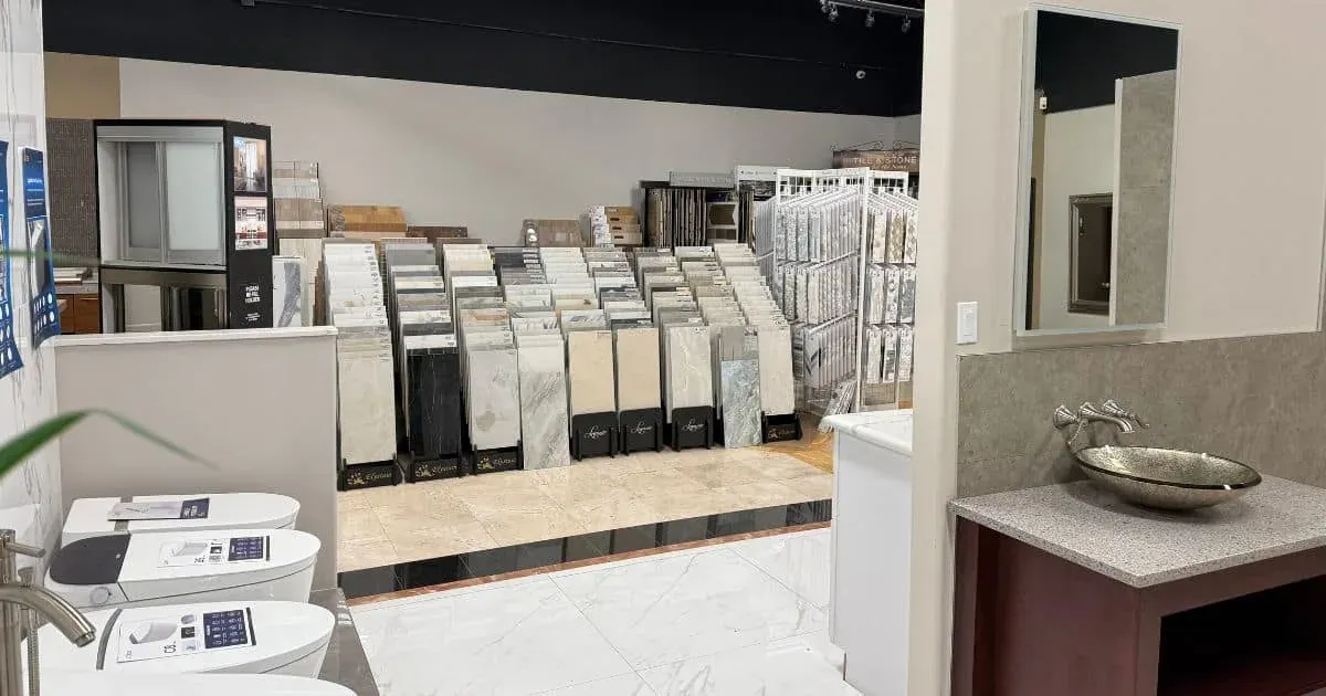 Countertop and tile sample boards displayed in rows in the Anaheim showroom
