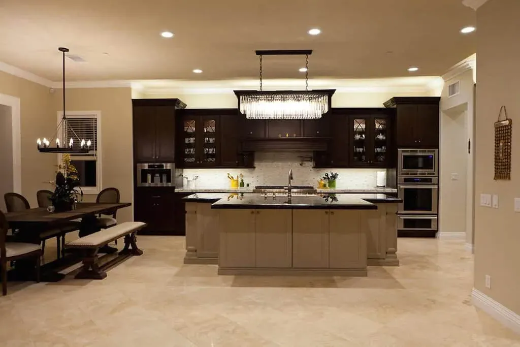 Coto de Caza kitchen remodel with full-height cabinetry and a stone worktop