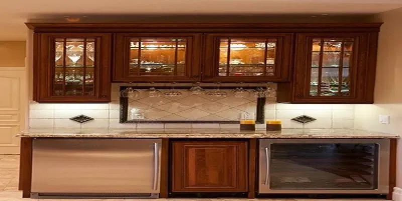 Cherry wall cabinets with leaded glass doors above a tile backsplash and a wine cooler