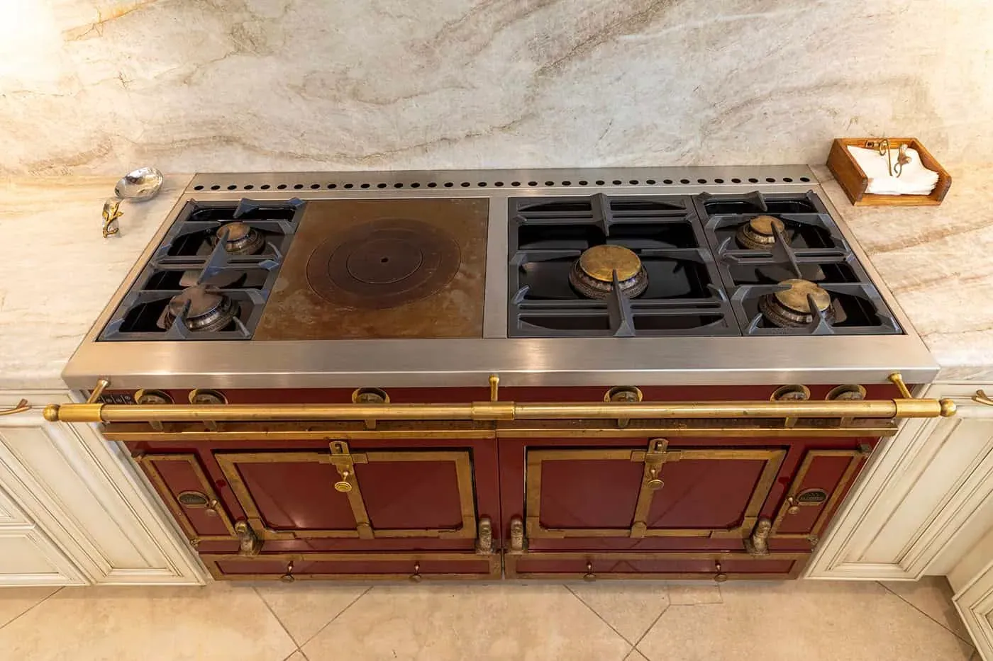 Newport Beach kitchen red professional range with brass trim, seen from above